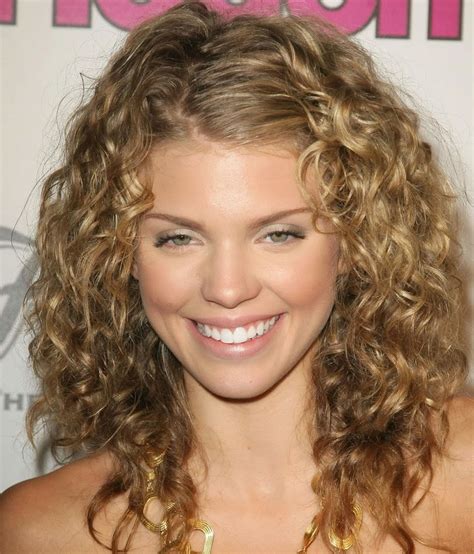 Shoulder length curly hairstyles - 6. Messy Top Bun. Save. A messy bun with long curly hair is one of the best hair styling ideas when you are on the run but want to look relaxed and fresh. Pin it on top of the head and wear a thin strand on your forehead to get that breezy look. 7. Messy Top Bun with Scarf.